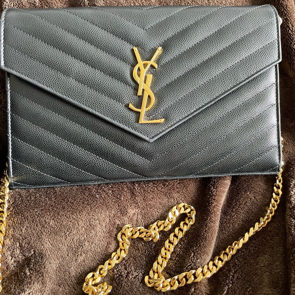 YSL CASSANDRE MATELASSÉ CHAIN WALLET IN GRAIN DE POUDRE EMBOSSED LEATHER